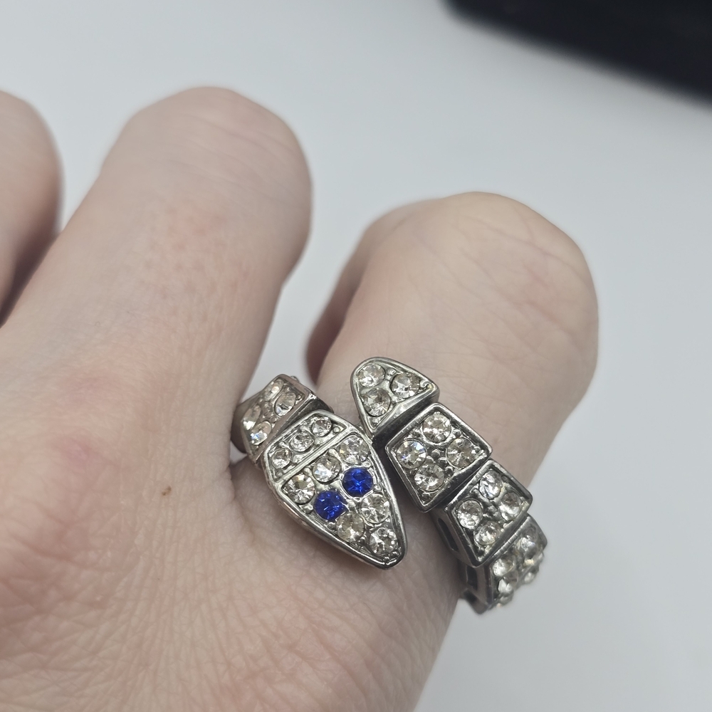 silver-toned, stretchable, snake-motif ring with clear and blue imitation gems